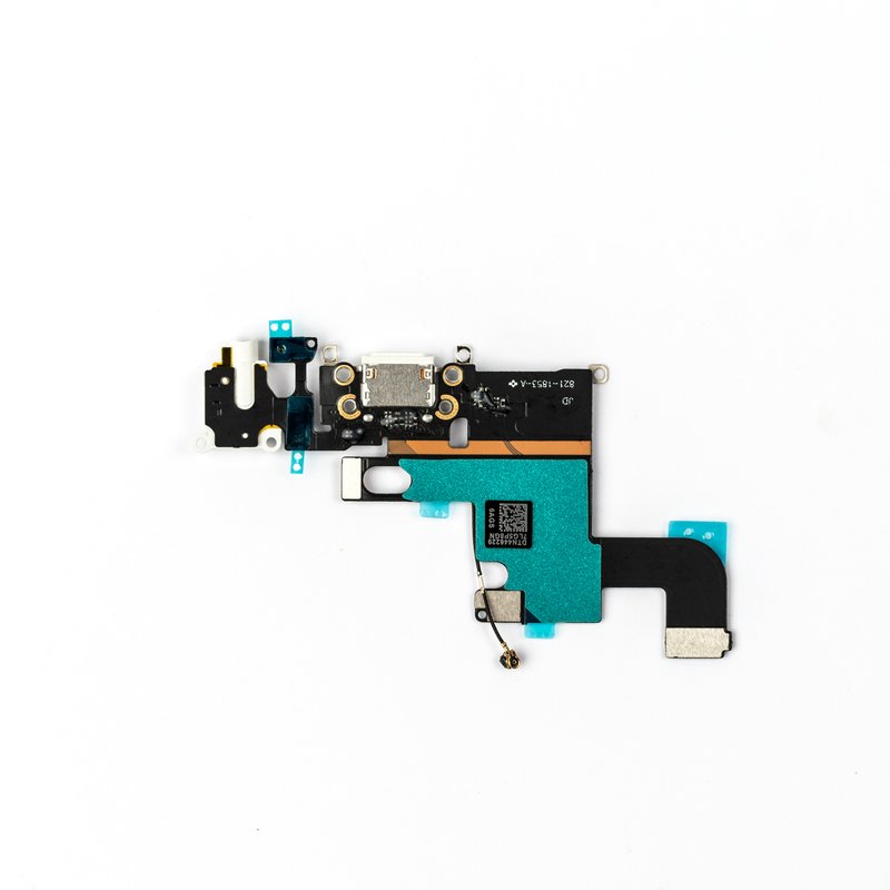 iPhone 6 charging port flex photographed from behind at an angle, showing the teal shield, orange tape, coaxial antenna lead and blue protective tabs.