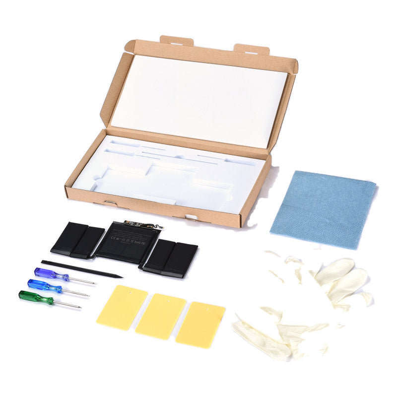The MacBook Pro 13 inch Touch Bar A1706 replacement battery, battery model A1819, shown in its open box with the supplied tools and accessories