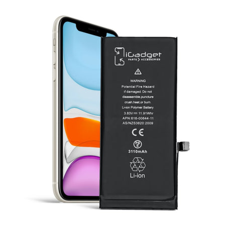 iPhone 11 replacement battery, a premium Li-ion cell rated 3110mAh with its connector flex, shown standing in front of a white iPhone 11 for size and fitment