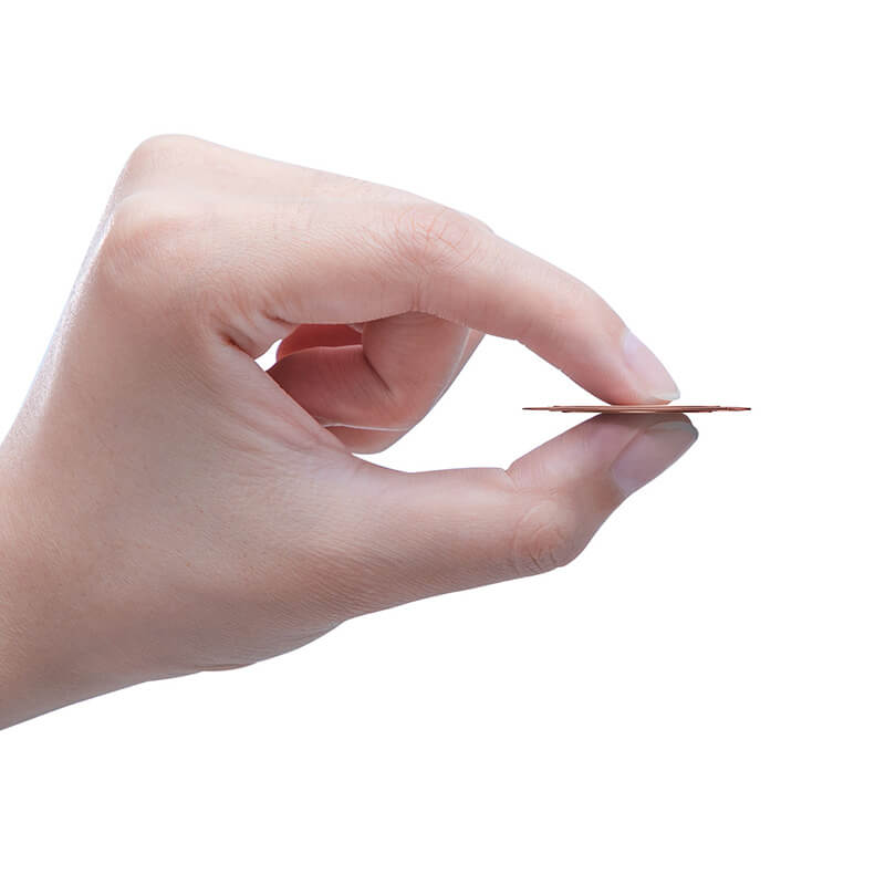 Baseus invisible phone ring rosegold holder in hand showing its thinness
