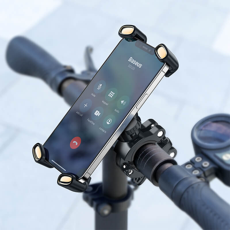 Baseus Quick Quadlock mount attached to bicycle along with a phone